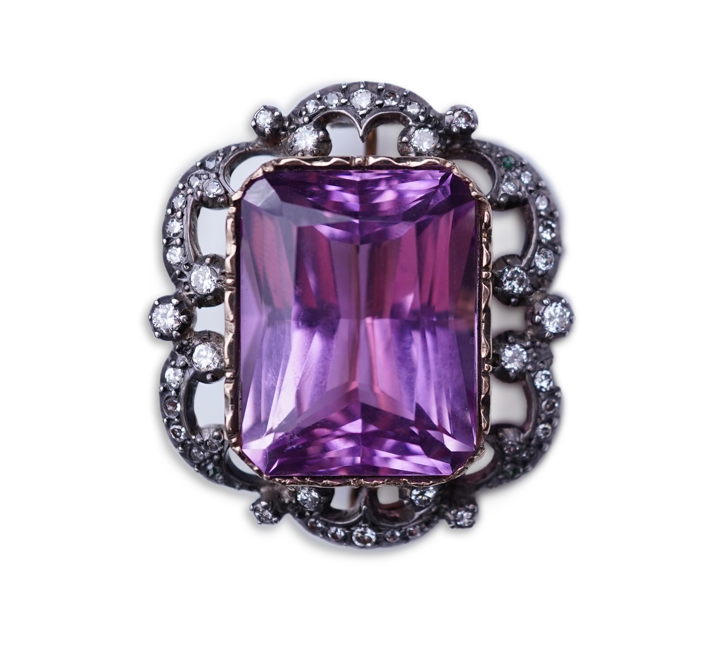 A fine kunzite and diamond brooch